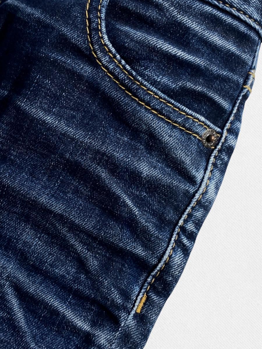 ダメージ加工テーパードデニムパンツ《MEDIUM WAIST JENNIFER JEAN》