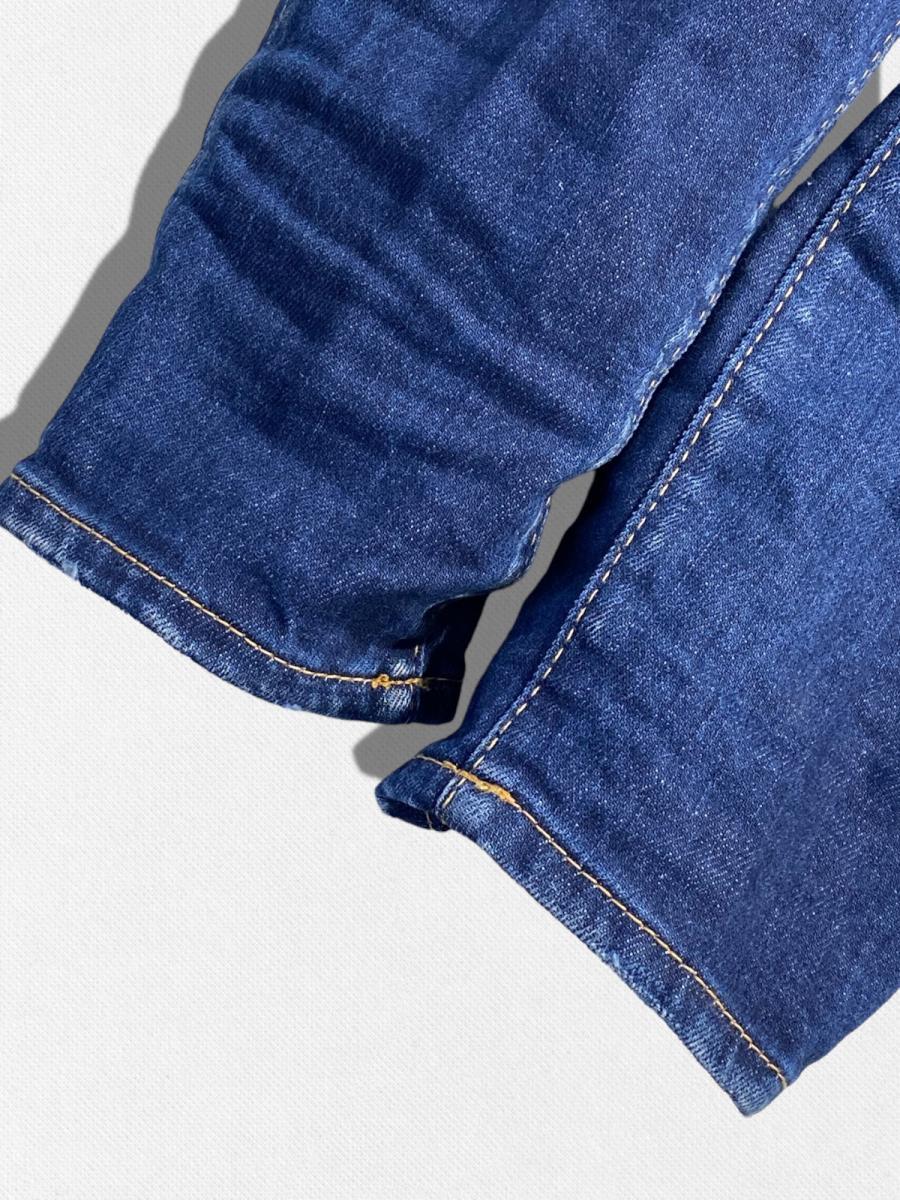 ダメージ加工テーパードデニムパンツ《MEDIUM WAIST JENNIFER JEAN》