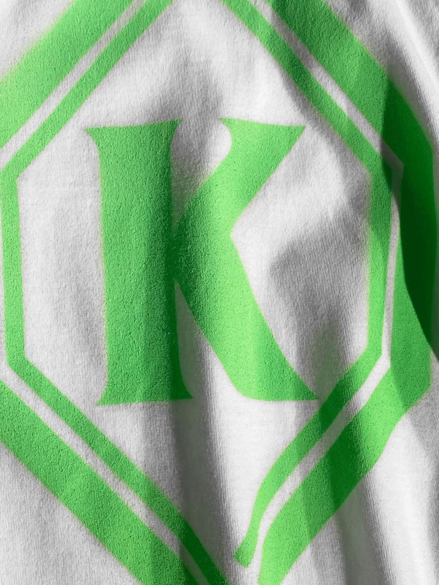 幾何学プリントTシャツ