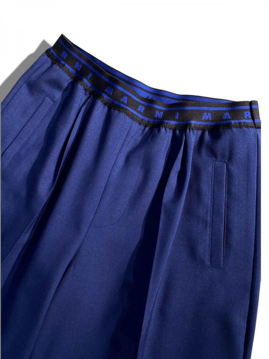 トロピカルウール製フレアワイドパンツ