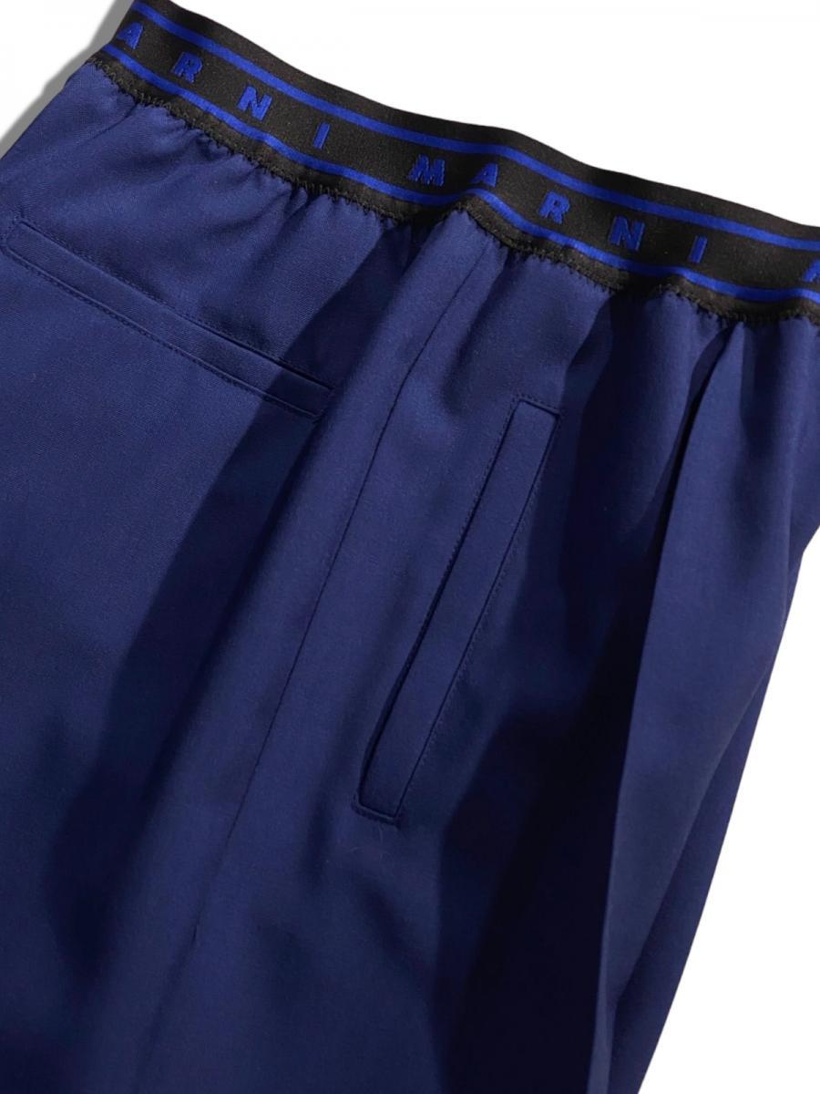 トロピカルウール製フレアワイドパンツ