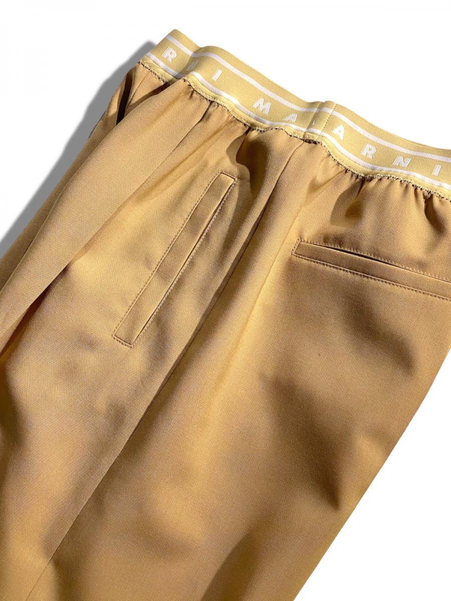 トロピカルウール製フレアワイドパンツ