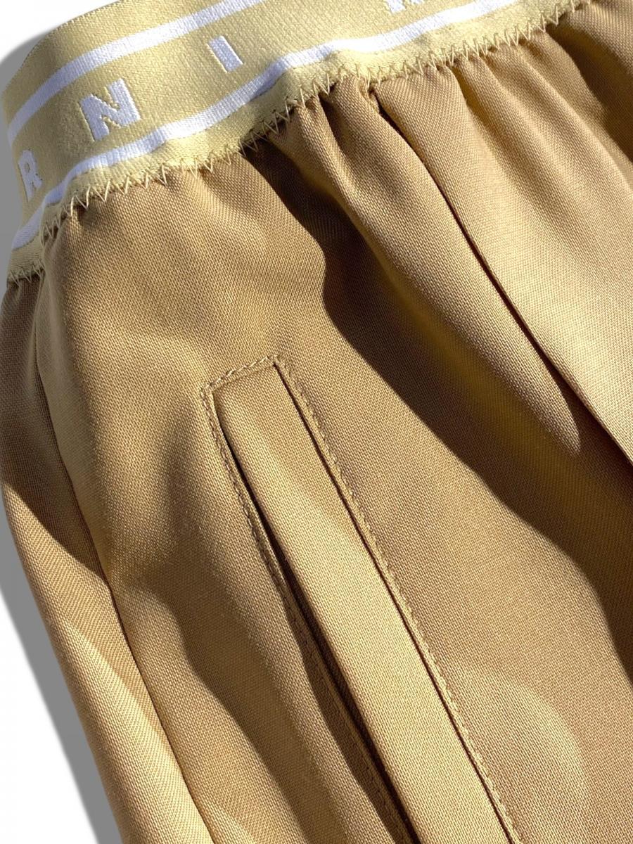 トロピカルウール製フレアワイドパンツ