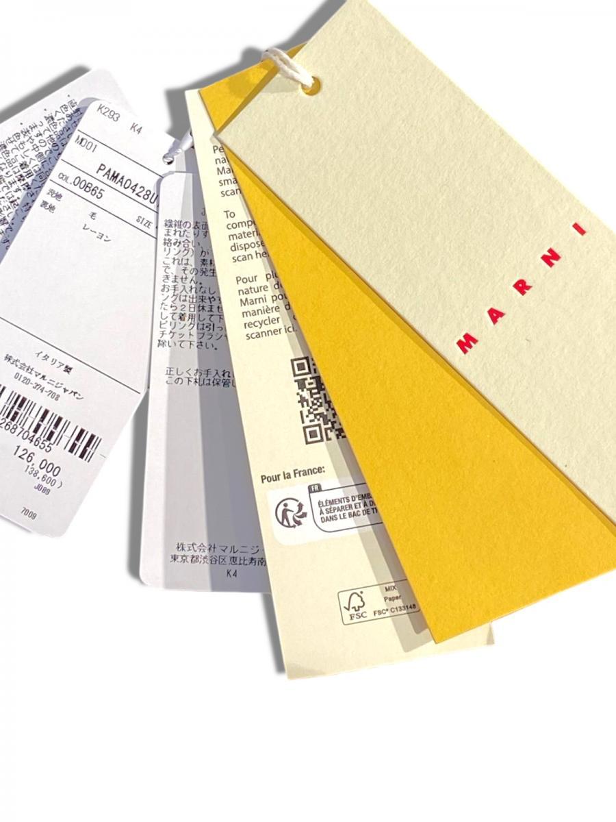 トロピカルウール製フレアワイドパンツ