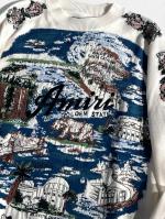刺繍入りインターシャニット