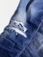 ダメージ加工テーパードデニムパンツ《MEDIUM WAIST JENNIFER JEAN》