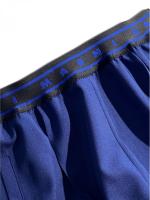 トロピカルウール製フレアワイドパンツ