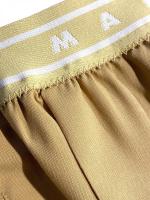 トロピカルウール製フレアワイドパンツ